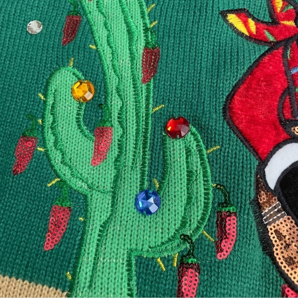Holiday Time Feliz Navidad
Santa Sombrero Guitar Boots
Green Christmas Sweater - Picture 8 of 14